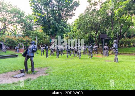 Lebensgroße Statuen, die den Tod von Jose Rizal im Manila Rizal Park auf den Philippinen darstellen Stockfoto