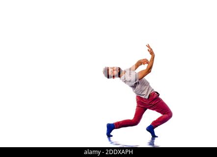 Disco Tänzer zeigen einige Bewegungen auf weißen Hintergrund isoliert Stockfoto