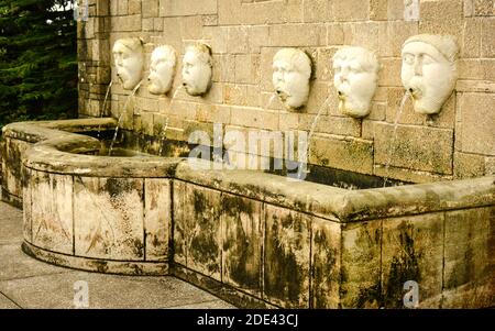 Die Fuente de los Canos de San Francisco Wasserauslauf Masken Brunnen Denkmal ist ein Wahrzeichen in St. Augustine, FL Stockfoto