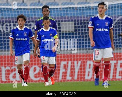 Doha, Katar. November 2020. Spieler von Yokohama F. Marinos reagieren nach dem AFC Champions League Fußballspiel gegen Shanghai SIPG in Doha, Katar, 28. November 2020. Quelle: Nikku/Xinhua/Alamy Live News Stockfoto