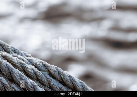 Nautisch - synthetische Seil Nahaufnahme und Bokeh im Hintergrund Stockfoto