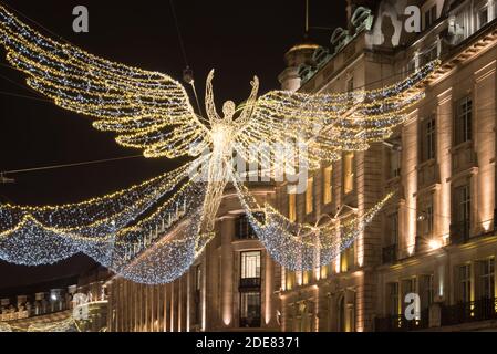 Weihnachten, Lichter, 2020 der Geist von Weihnachten Schwimmender Engel Festliche Periode Glow Regent Street. West End, Westminster, London, W1B Stockfoto