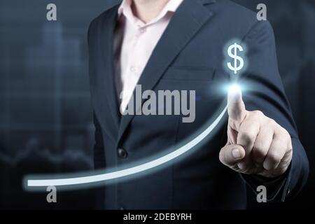 Geschäftskonzept für Wachstum. Business Development to Success and Growth Concept. Geschäftsmann zeigt Finger Graph Unternehmen zukünftigen Wachstumsplan Stockfoto