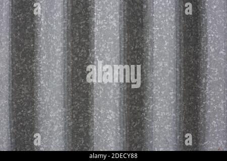 Profilblechoberfläche. Nahaufnahme einer grauen Stahlplatte. Graues Seitenende Stockfoto