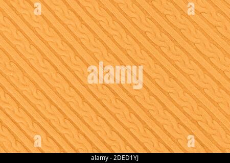 Orange diagonale Strickmode Stoff Textur Stockfoto