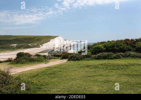 Sussex's einzige unerschlossenen Flussmündung enthält die faszinierendsten Landschaften der Südküste, geschützt durch die NT, Country Park und SSSI Systeme. Stockfoto