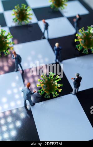 Miniaturunternehmer üben soziale Distanzierung, um die Ausbreitung des tödlichen Coronavirus zu verlangsamen Stockfoto
