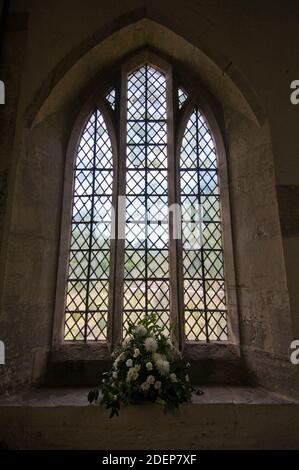 Eines der Fenster der St. Bridget's Church in Skenfrith, South Wales. Stockfoto