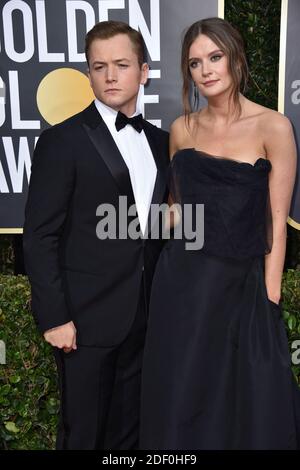 Taron Egerton und Emily Thomas, die an den 77. Golden Globe Awards teilnehmen, kommen am 5. Januar 2020 im Beverly Hilton, Los Angeles, CA, USA an. Foto von Lionel Hahn/ABACAPRESS.COM Stockfoto