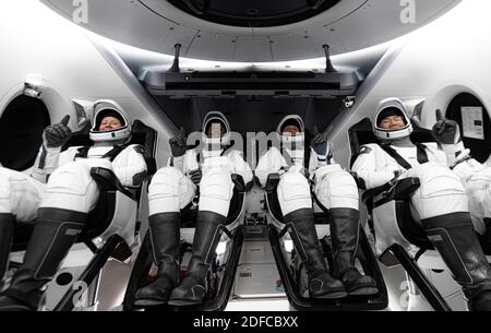 CAPE CANAVERAL, FL, USA - 11. November 2020 - von links, Mission Specialist Shannon Walker, Pilot Victor Glover, Crew Dragon Commander Michael Hopkins Stockfoto