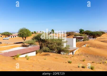 Al Madam Geisterstadt Landschaft, Dorfgebäude in Sanddünen begraben, von bösen djinn gejagt, von Menschen verlassen. Stockfoto