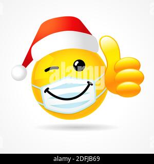 Zwinkendes Lächeln in medizinischer Maske zeigt Daumen mit Weihnachtsmann Hut. Emoji-Gesicht mit weißer Schutzmaske und roter Claus-Mütze Stock Vektor