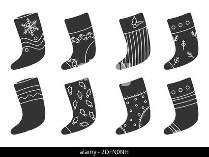 Glyphe Weihnachten Socken Set. Weihnachtsstiefel mit Schneeflocke, Beere. Traditionelle Retro Weihnachtsstrumpf als Geschenk. Accessoires für Wintergeschenke. Home Dekoration auf Neujahr isoliert auf weißen Vektor-Illustration Stock Vektor