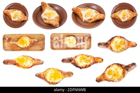 Set von verschiedenen adjarianischen Boot-förmigen khachapuri (kaukasischen georgischen Kuchen mit Käse, Butter und Ei) isoliert auf weißem Hintergrund Stockfoto