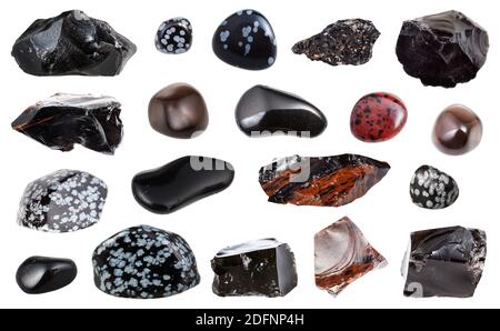 Sammlung von verschiedenen Obsidian (vulkanisches Glas) Natürliche mineralische Edelsteine und Proben von Gestein isoliert auf Weißer Hintergrund Stockfoto