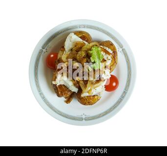 Bacalhau a lagareiro - Portugiesischer gegrillter, gesalzener Kabeljaufisch Stockfoto