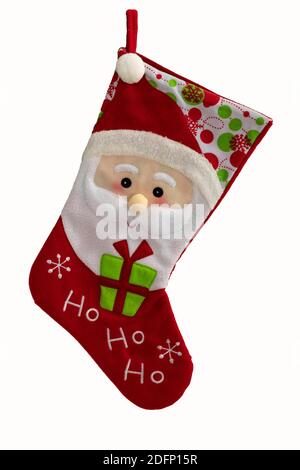Ein schöner roter leerer Weihnachtsstrumpf mit weihnachtsmann-Gesicht darauf und auf weißem Hintergrund. Stockfoto