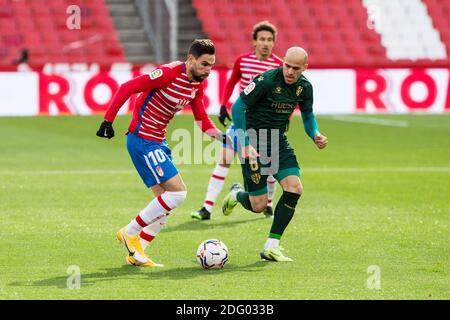 Antonio Puertas von Granada und Sandro Ramirez von Huesca während Die spanische Meisterschaft La Liga Fußballspiel zwischen Grana / LM Stockfoto