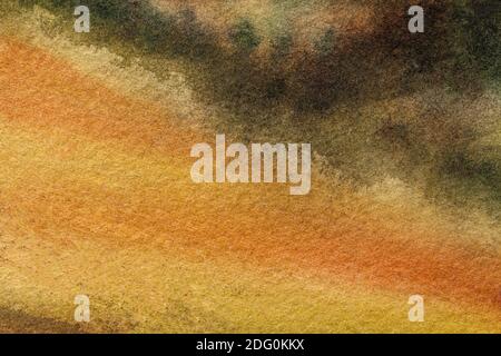 Abstrakte Kunst Hintergrund dunkelorange und schwarz Farben. Aquarellmalerei auf Leinwand mit sanftgelbem Farbverlauf. Fragment der Arbeit auf Papier mit patte Stockfoto