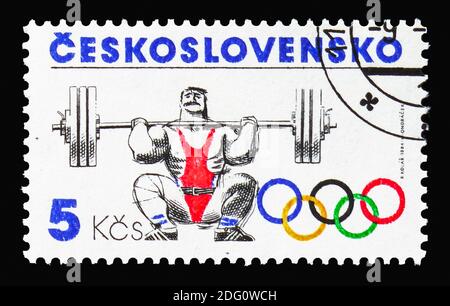 MOSKAU, RUSSLAND - 18. AUGUST 2018: Eine in der Tschechoslowakei gedruckte Briefmarke zeigt Gewichtheben, Olympische Spiele 1984 - Los Angeles Serie, um 1984 Stockfoto