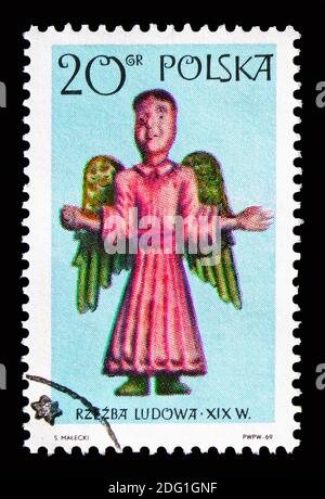 MOSKAU, RUSSLAND - 18. AUGUST 2018: Eine in Polen gedruckte Briefmarke zeigt Angel, Folk Art Serie, um 1969 Stockfoto