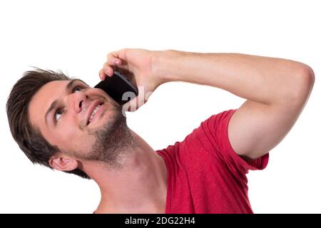 Junger Mann am Telefon sprechen Stockfoto