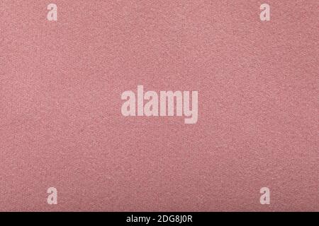 Feiner rosa Textur Hintergrund. Samt Scarlet matt Hintergrund aus Pfirsich Wildleder Stoff. Stockfoto