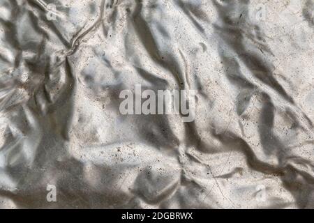 Hintergrund metallisch ungleichmäßig und zerknittert Wirkung der flüssigen Metallbasis Stockfoto