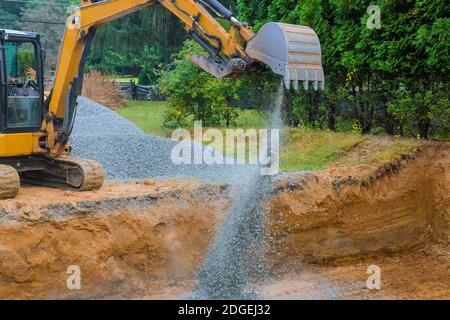 Industriebagger für Fundamentbau Baustelle, Eimer Details, Schotter Stockfoto