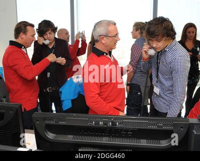 Harry Styles und Liam Payne von One Direction beim BGC Annual Global Charity Day, Canary Wharf, London. Stockfoto