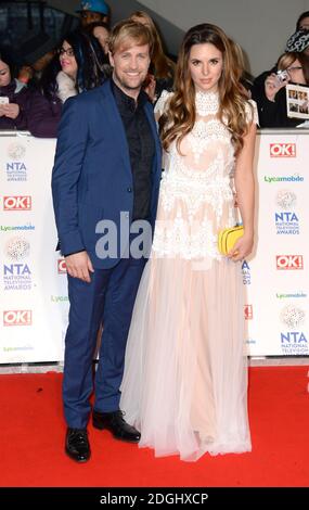 Kian Egan und Jodi Albert bei der Ankunft bei den National Television Awards 2014, O2 Arena, Greenwich, London. Stockfoto