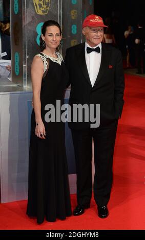 Niki Lauda und Birgit Wetzinger bei den EE British Academy Film Awards 2014 im Royal Opera House, Bow Street, London. Stockfoto