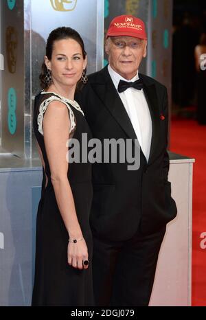 Niki Lauda und Birgit Wetzinger bei den EE British Academy Film Awards 2014 im Royal Opera House, Bow Street, London. Stockfoto