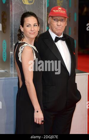 Niki Lauda und Birgit Wetzinger bei den EE British Academy Film Awards 2014 im Royal Opera House, Bow Street, London. Stockfoto