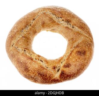 Roggenweizenbrot in Ringform auf hellem Hintergrund. Draufsicht Stockfoto