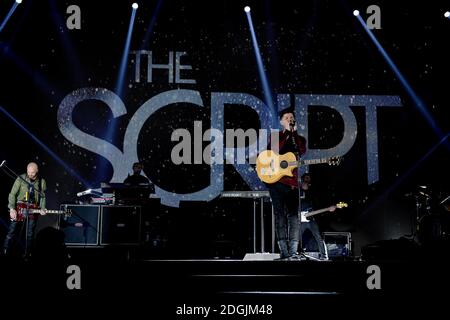 EXKLUSIVE Mark Sheehan, Danny O'Donoghue und Glen Power (von links nach rechts) von The Script live auf der Bühne während des Capital FM Jingle Bell Ball 2014 in der O2 Arena, London Stockfoto