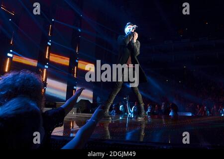 EXKLUSIVE Danny O'Donoghue von The Script live auf der Bühne während des Capital FM Jingle Bell Ball 2014 in der O2 Arena, London Stockfoto