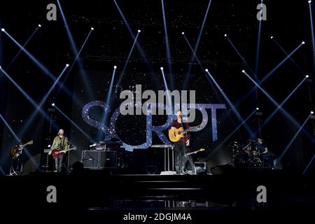 EXKLUSIVE Mark Sheehan, Danny O'Donoghue und Glen Power (von links nach rechts) von The Script live auf der Bühne während des Capital FM Jingle Bell Ball 2014 in der O2 Arena, London Stockfoto