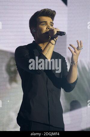 EXKLUSIV Josh Cuthbert von Union J live auf der Bühne während des Capital FM Jingle Bell Ball 2014 in der O2 Arena, London statt. Stockfoto