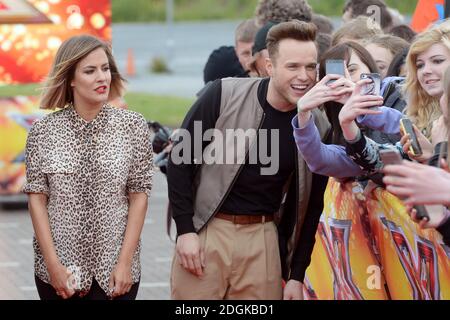 Caroline Flack und Olly Murs kommen für die X Factor Auditions in EventCity, Manchester City. Stockfoto