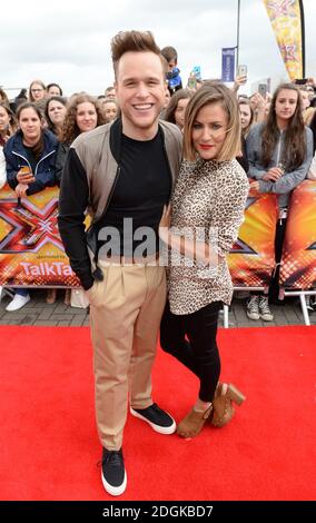 Olly Murs und Caroline Flack kommen für die X Factor Auditions in EventCity, Manchester City. Stockfoto
