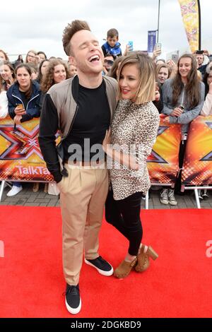Olly Murs und Caroline Flack kommen für die X Factor Auditions in EventCity, Manchester City. Stockfoto