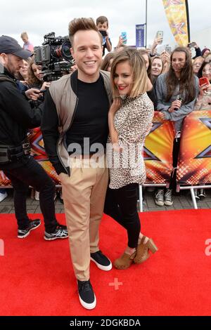 Olly Murs und Caroline Flack kommen für die X Factor Auditions in EventCity, Manchester City. Stockfoto