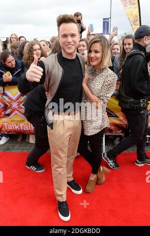 Olly Murs und Caroline Flack kommen für die X Factor Auditions in EventCity, Manchester City. Stockfoto