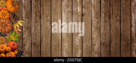 Natürlicher Herbst Doppelrand von Kürbissen und Blättern. Draufsicht auf einem rustikalen dunklen Holz Banner Hintergrund mit Kopierraum. Stockfoto