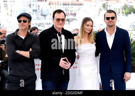 Brad Pitt (links), Quentin Tarantino, Margot Robbie und Leonardo DiCaprio beim Once Upon a Time in Hollywood Photocall während des 72. Cannes Film Festivals. Bildnachweis sollte lauten: Doug Peters/EMPICS Stockfoto