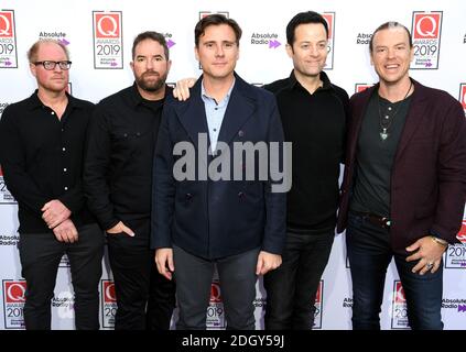 Mitglieder der Band Jimmy Eat World, Rick Burch, Zach Lind, Jim Adkins und Tom Linton (von links nach rechts) während der Q Awards 2019 im Roundhouse, London. Stockfoto