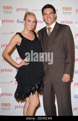 Camilla Dallerup und Kevin Sacre kommen für die Comfort Prima High Street Fashion Awards 2008 im Battersea Evolution Matquee im Battersea Park im Südwesten Londons an. Stockfoto