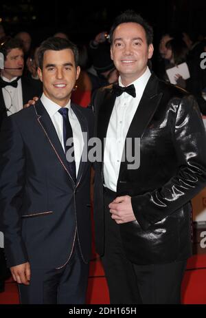 Grant MacPherson und Craig Revel Horwood kommen bei den National Television Awards in der O2 Arena in London an Stockfoto