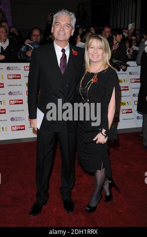 Phillip Schofield und Frau Stephanie Lowe während der Daily Mirror Pride of Britain Awards 2010, The Grosvenor House Hotel, Park Lane, London. Stockfoto